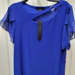Atelier 29-Vibrant blue ladies top with cut out neckline with silver accent.